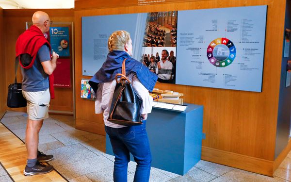 visitors exploring an exhibition